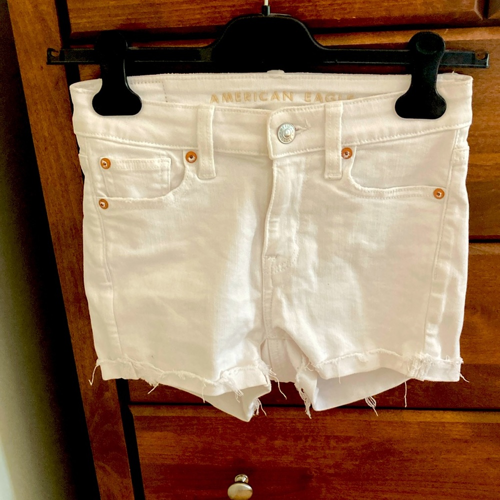 Like new, slightly frayed (on purpose) bright white American Eagle cut-offs
